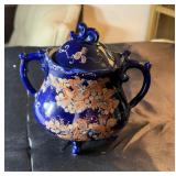 Blue oriental vase, approximately 5 inches tall