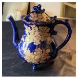 Blue oriental pitcher, approximately 7 inches