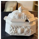 White dish, approximately 6.5 inches tall, has