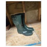 Pair of green rain boots, size 10