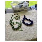 Green and purple bead sets