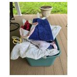 Tote of miscellaneous, including rugs, flowers,