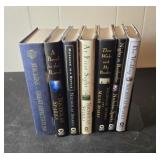 Grouping of Nicholas Sparks books and a Charles