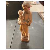 Joseph with baby Jesus figurine