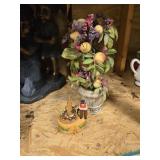 Fruit vase and wooden figurine