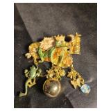King frog with smaller dangling frog broach