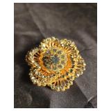 Gold and crystal broach