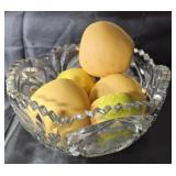 Cut glass bowl with artificial apples