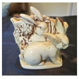 A McCoy rabbit planter, has small chip