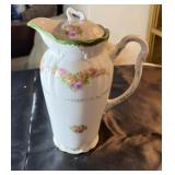 Rose pattern pitcher, approximately 8.5 inches