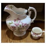 Decorative porcelain pitcher with cup