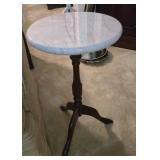 Marble top table. 21 inches tall by 12 inches