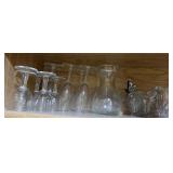 Shelf of misc glass ware