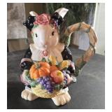 Rabbit holding a pumpkin
