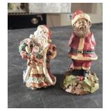 A Santa by Tom Clark and a smaller Santa