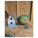 Birdhouse and a frog planter