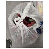 Bag of artificial grapes and ornaments