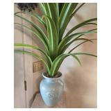 Vase of artificial flowers