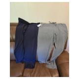 2 pair of athletic paints size 12 to 14 large.