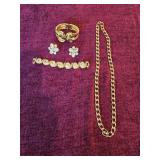 Necklace pair of braclets and earrings