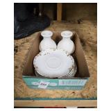 Lot of candle holders and saucers