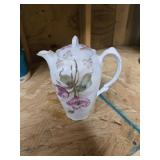 A flower teapot, approximately 8 inches
