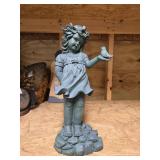 Little girl with bird statue, 16 inches tall