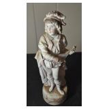 Figurine of mandelan player