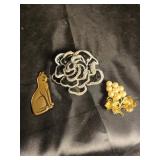Three beautiful broaches