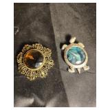 Turtle and brown broach