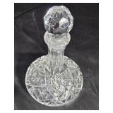 Small cut glass decanter 7 inches tall.