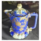 Porcelain teapot blue z& white with gold trim