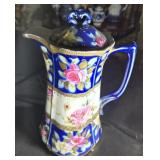 Porcelain Pitcher decorated with pink roses