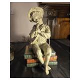 Blue boy playing horn 14 inches tall