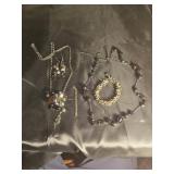 Pair of necklaces braclet and earrings