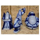 Group of blue decorative Santas