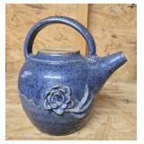 Blue pottery pitcher, approximately 6 inches tall