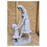 Mom and daughter playing statue, approximately 15