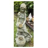 Lady pouring water statue