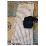 Brace and a small table runner