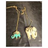 Pair of elephant necklaces