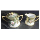 Sugar & creamer made of porcelain in France