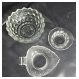 3 pieces of clear glassware 2 are America