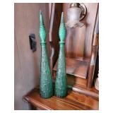 Unusual green glass decanters approx 22 inches