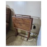 Pair of tray tables on a stand