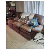 Couch in rough condition good for a garage with