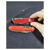 Pair of Swiss Army knives