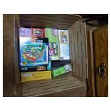 Box of various puzzles