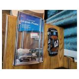 Pair of license plates and Earnhardt car