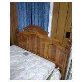 Full size bed with floral pattern